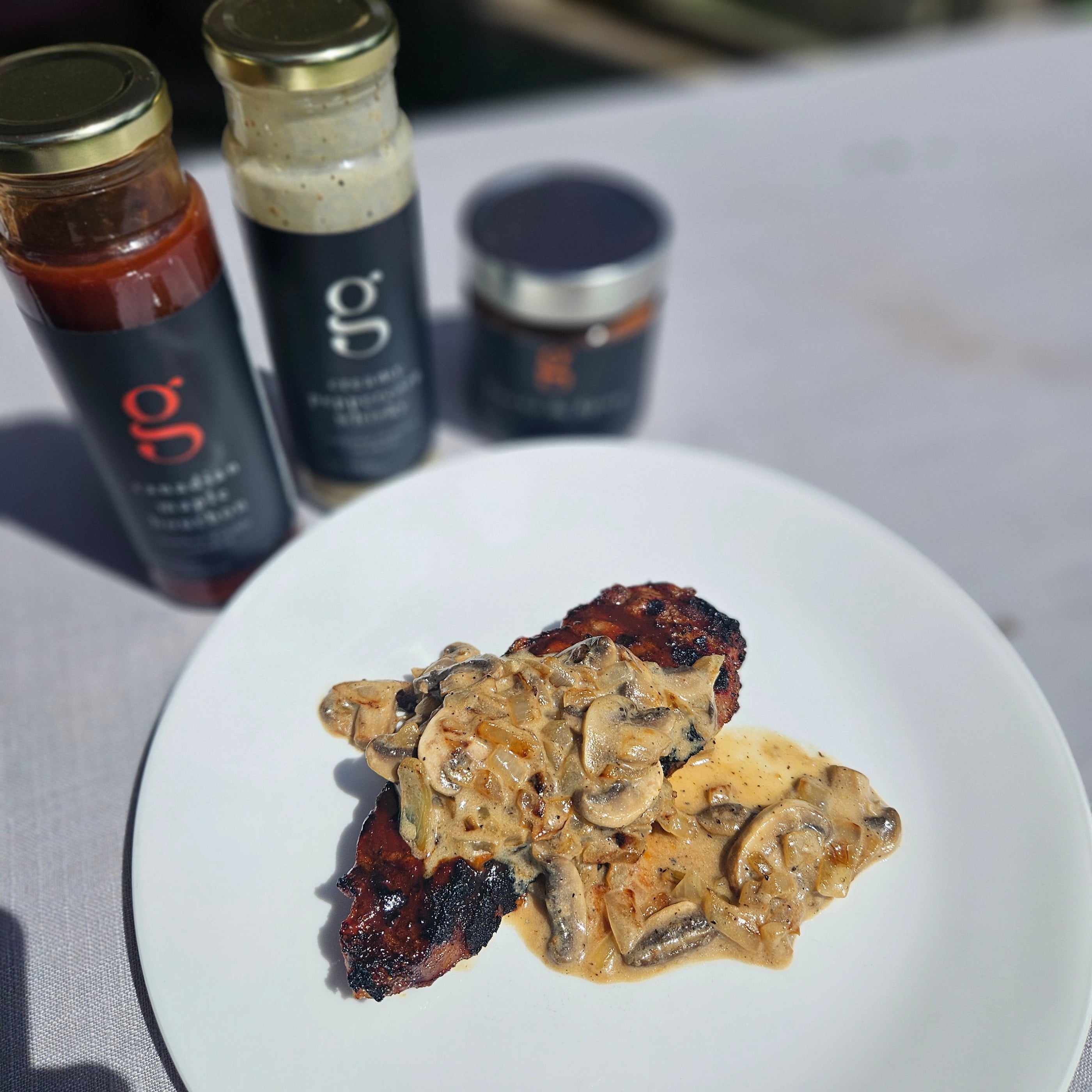 NY Strip with Canadian Maple Bourbon BBQ & Creamy Peppercorn Whisky Mushrooms