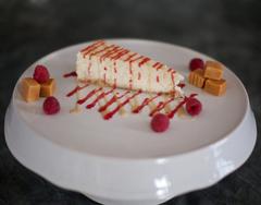New York Cheesecake with Raspberry Coulis and Salted Caramel Whisky Sauce