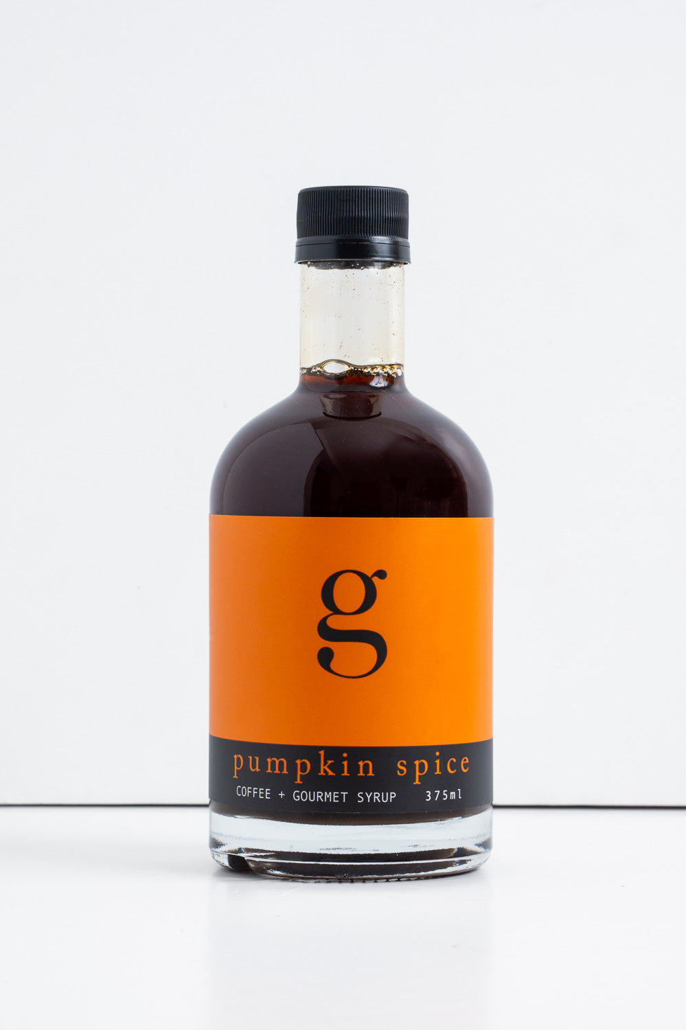 Bottle of Gourmet Inspirations Pumpkin Spice Gourmet Syrup – warm spices perfect for autumn beverages.