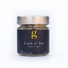 Jar of Gourmet Inspirations Land n' Sea Rub – perfect for seasoning fish and seafood.